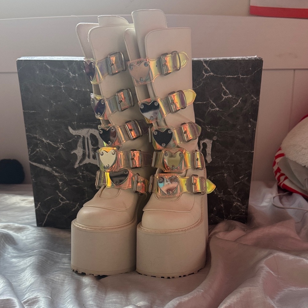Demonia White Platform Boots with Iridescent Buckles